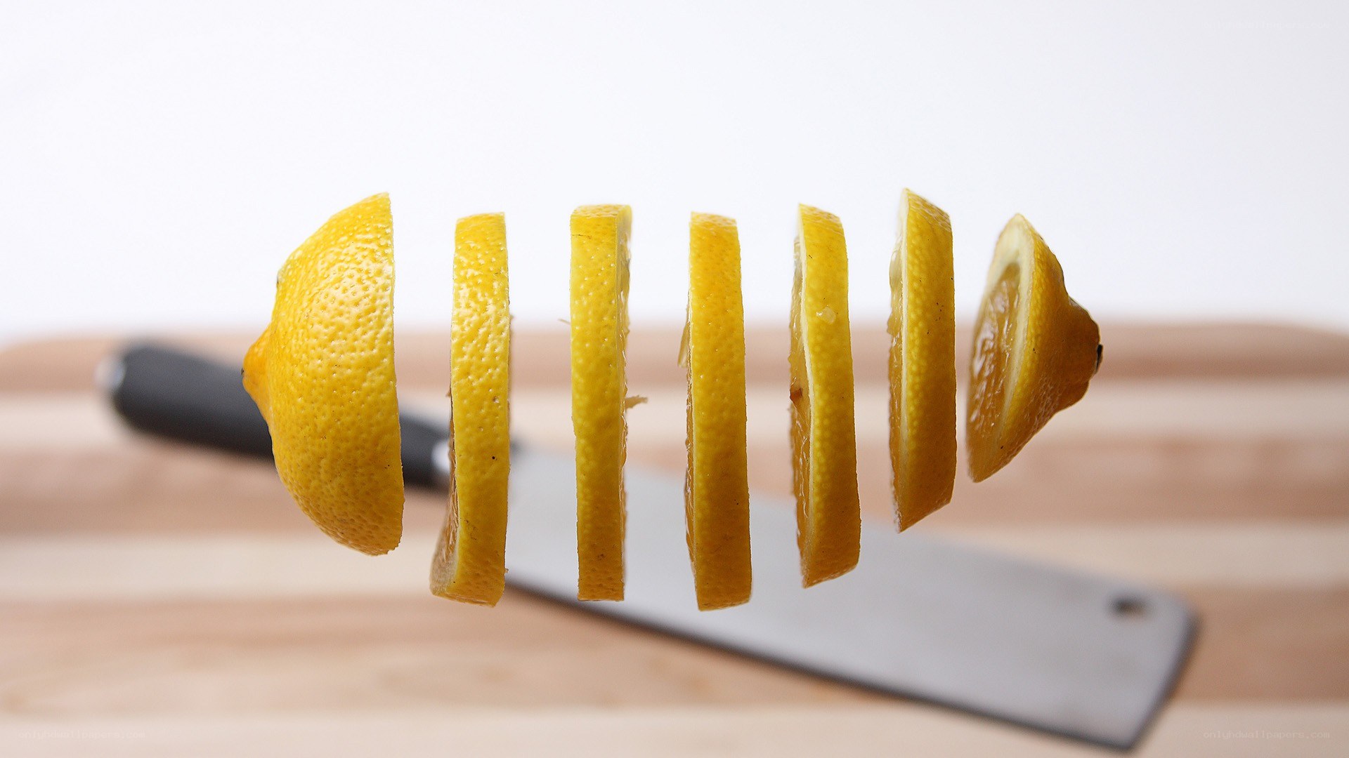 lemon slices in mid-air