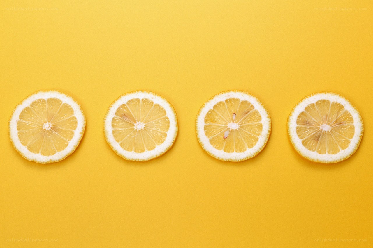 lemon slices on yellow