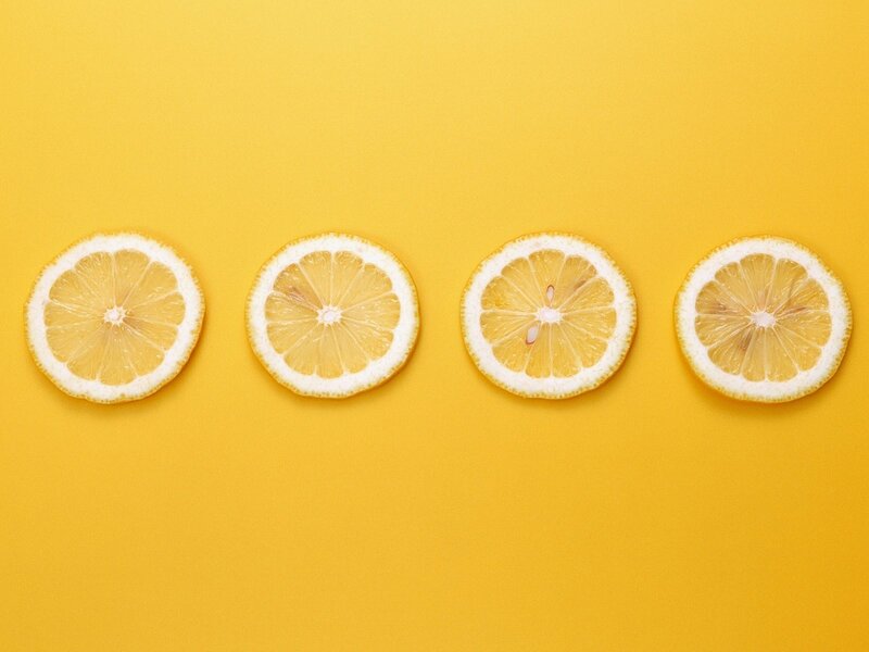 lemon slices on yellow