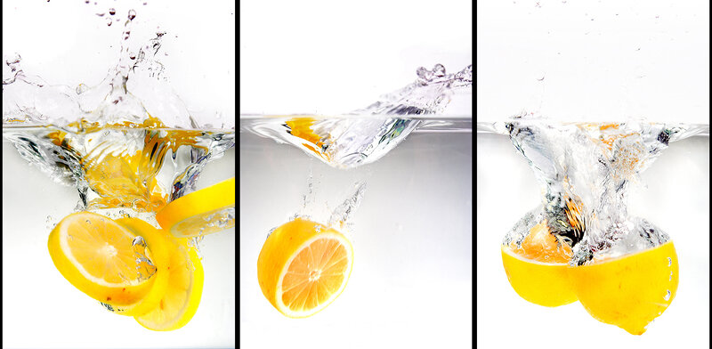 Lemon Slices Splashing in Water — Yellow