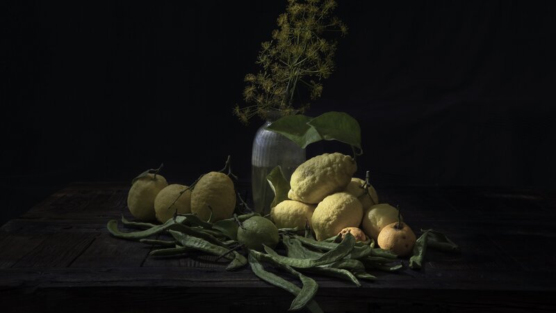 Lemons and Flowers on Wood