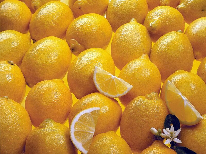Lemons and Lemon Slices — Yellow, Bright, Photograph