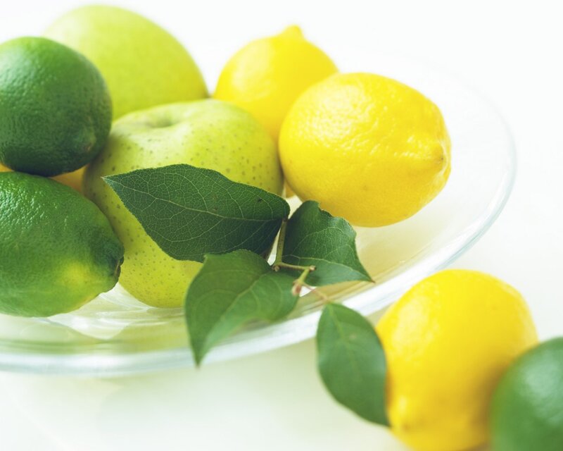 lemons and limes in a bowl