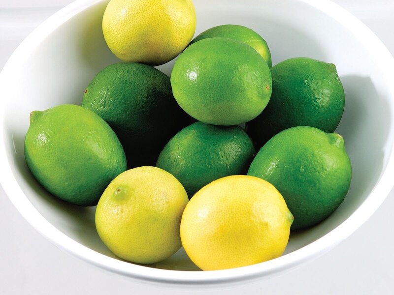 lemons and limes in a bowl