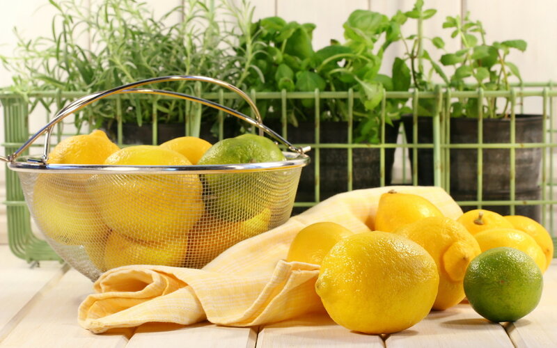 Lemons and Limes in Basket