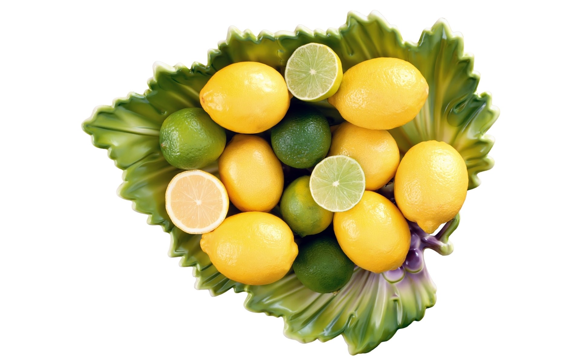 lemons and limes in leaf bowl