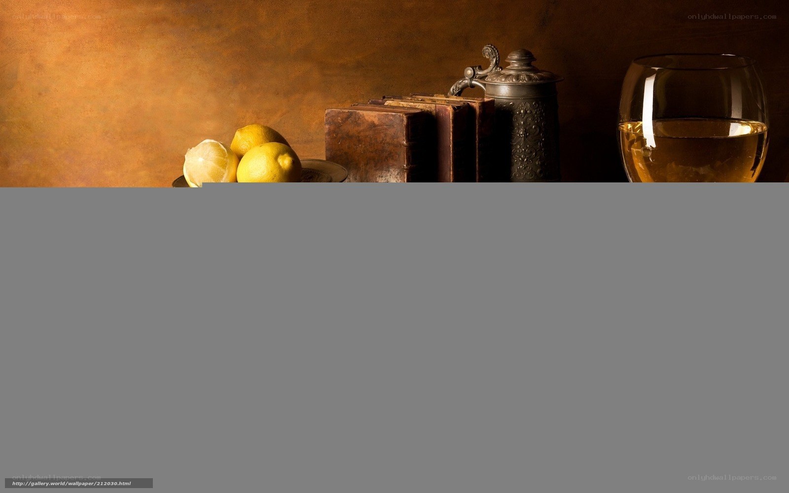 lemons, books, and wine glass
