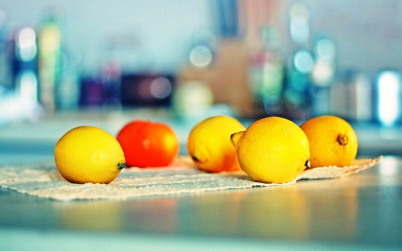 lemons on a kitchen counter