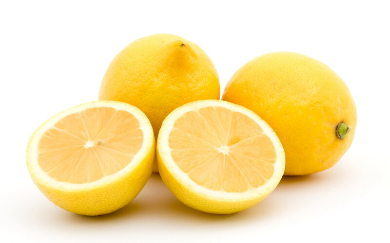 Lemons on White Surface — Yellow