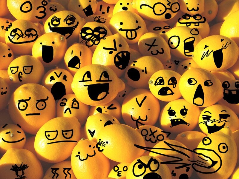 lemons with drawn faces