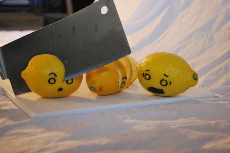 lemons with faces being cut