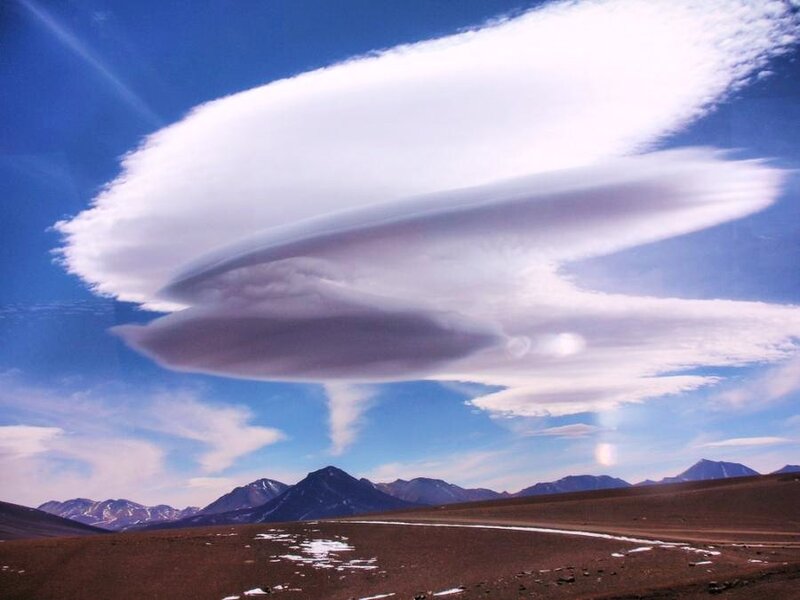 Lenticular cloud over mountains