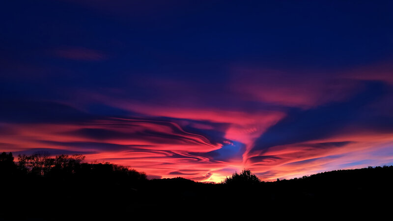 Lenticular Clouds at Sunset — Red