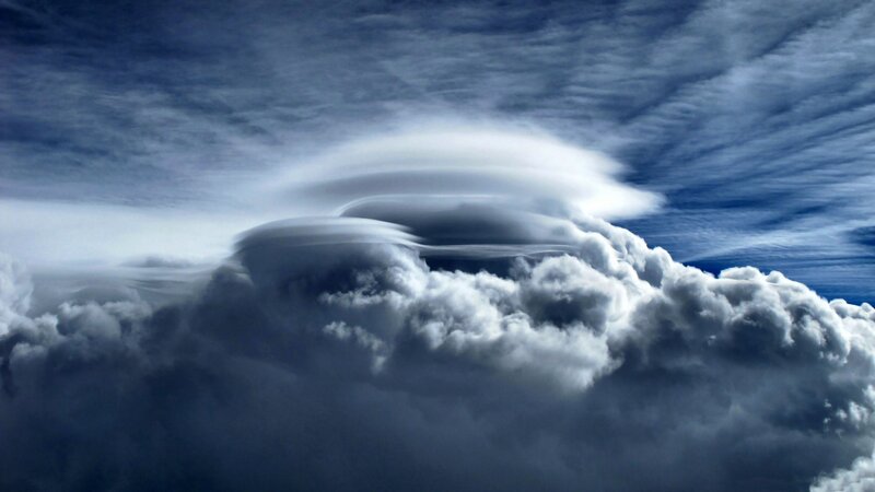 Lenticular Clouds in Sky — Blue