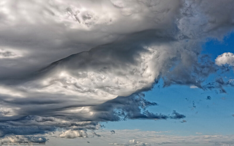 Lenticular Clouds in Sky — Gray