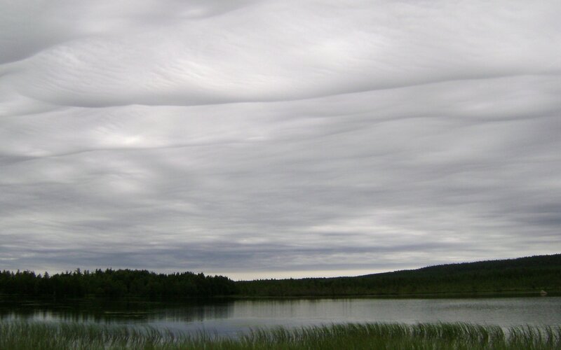 Lenticular Clouds over Lake
