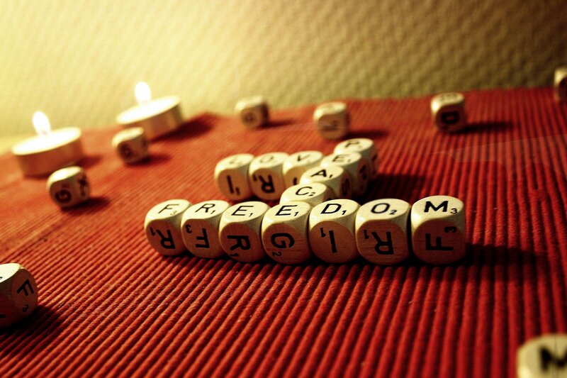 Letter Cubes on Red Surface