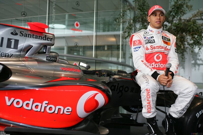 Lewis Hamilton with McLaren car