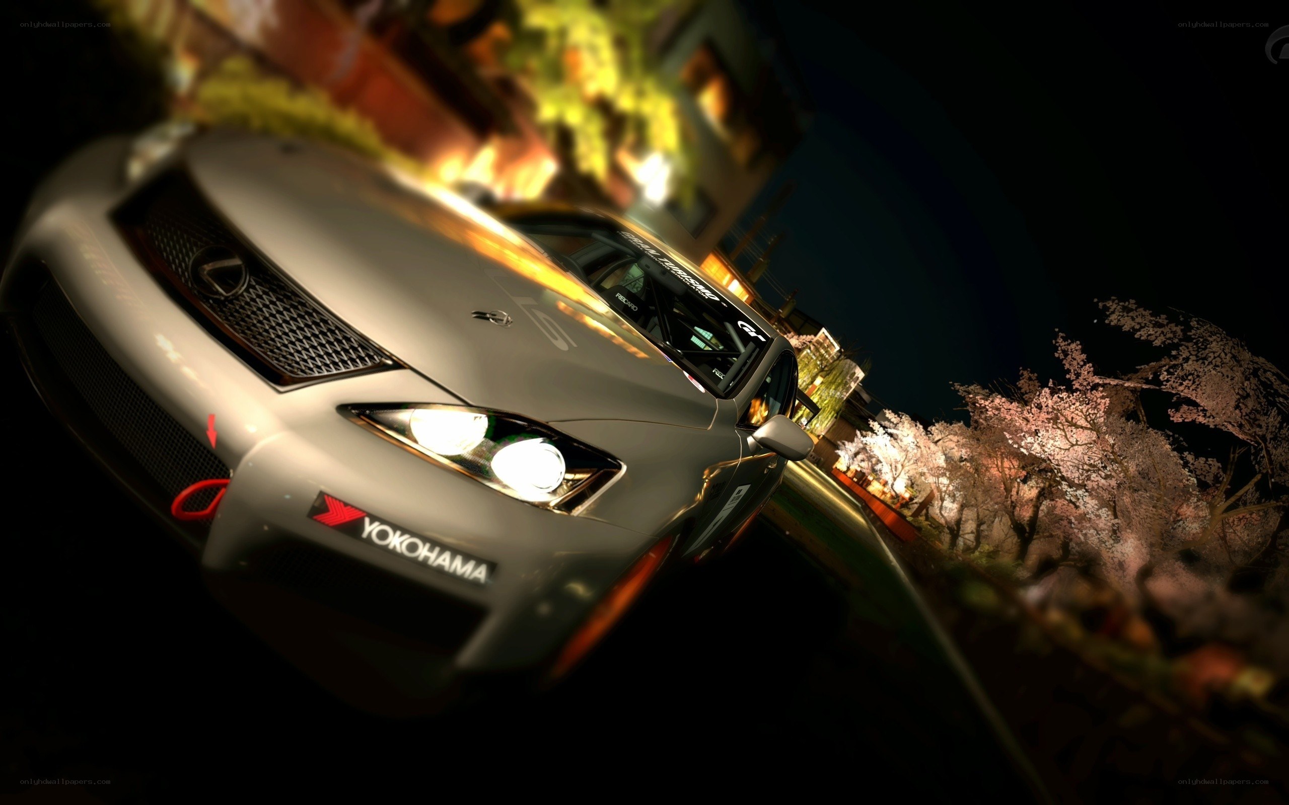 Lexus at night with cherry blossoms