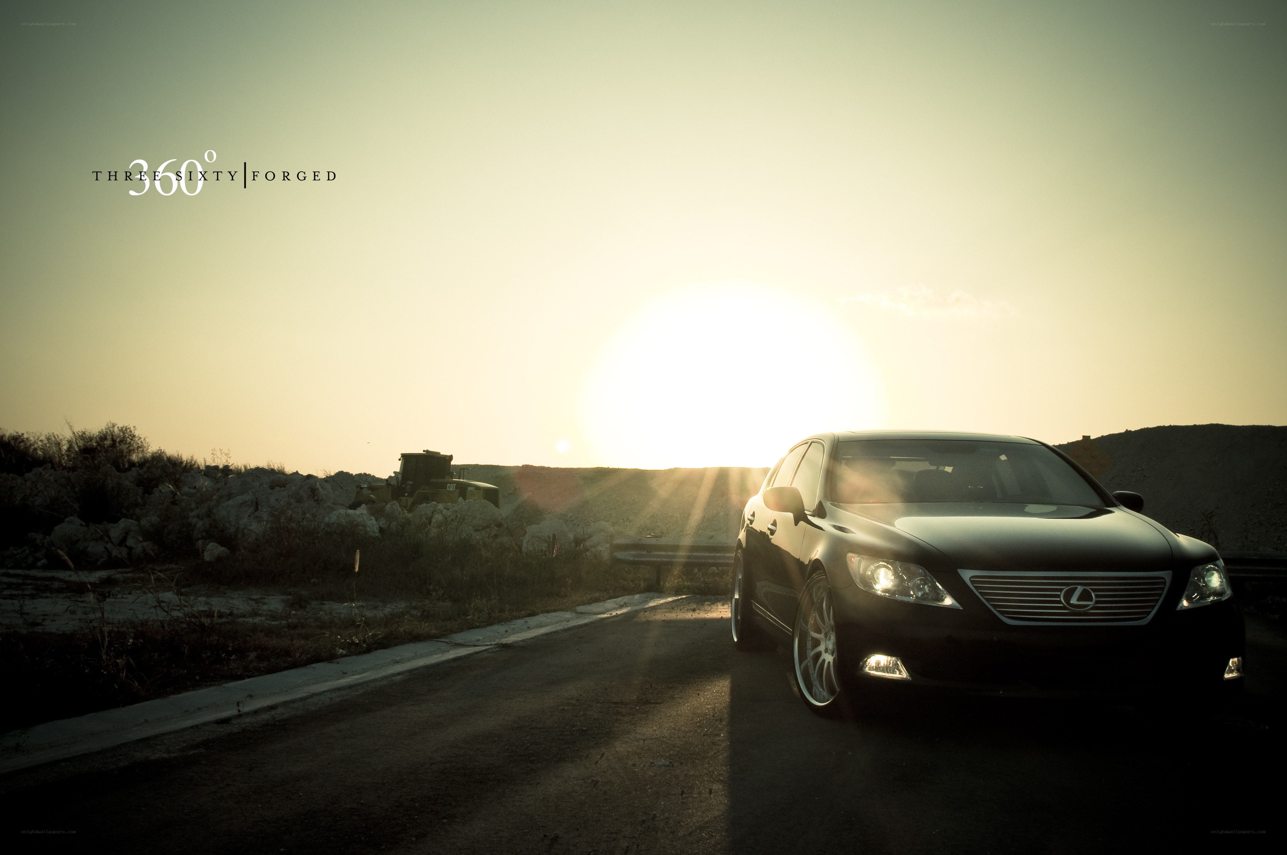 Lexus at sunset on a road