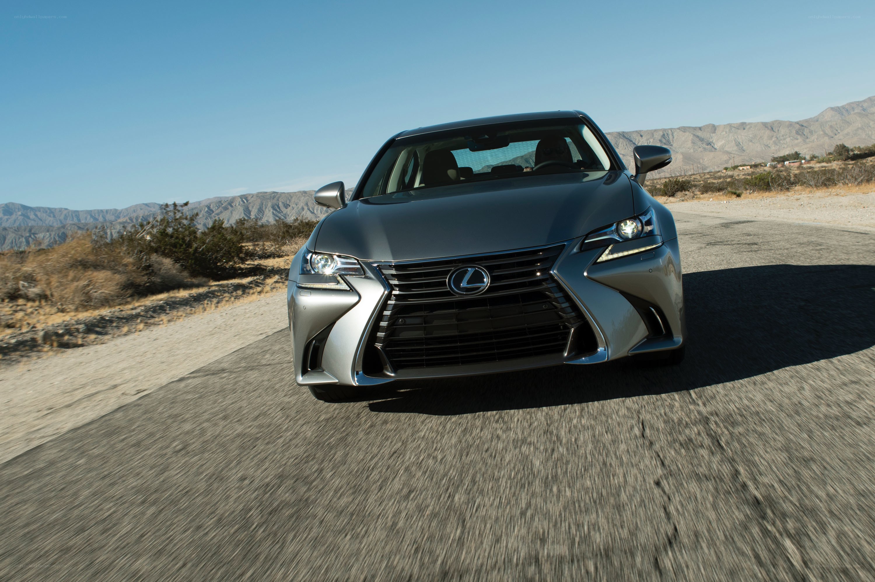 Lexus driving on desert road