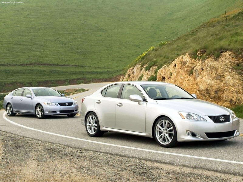 Lexus IS sedans on a winding road
