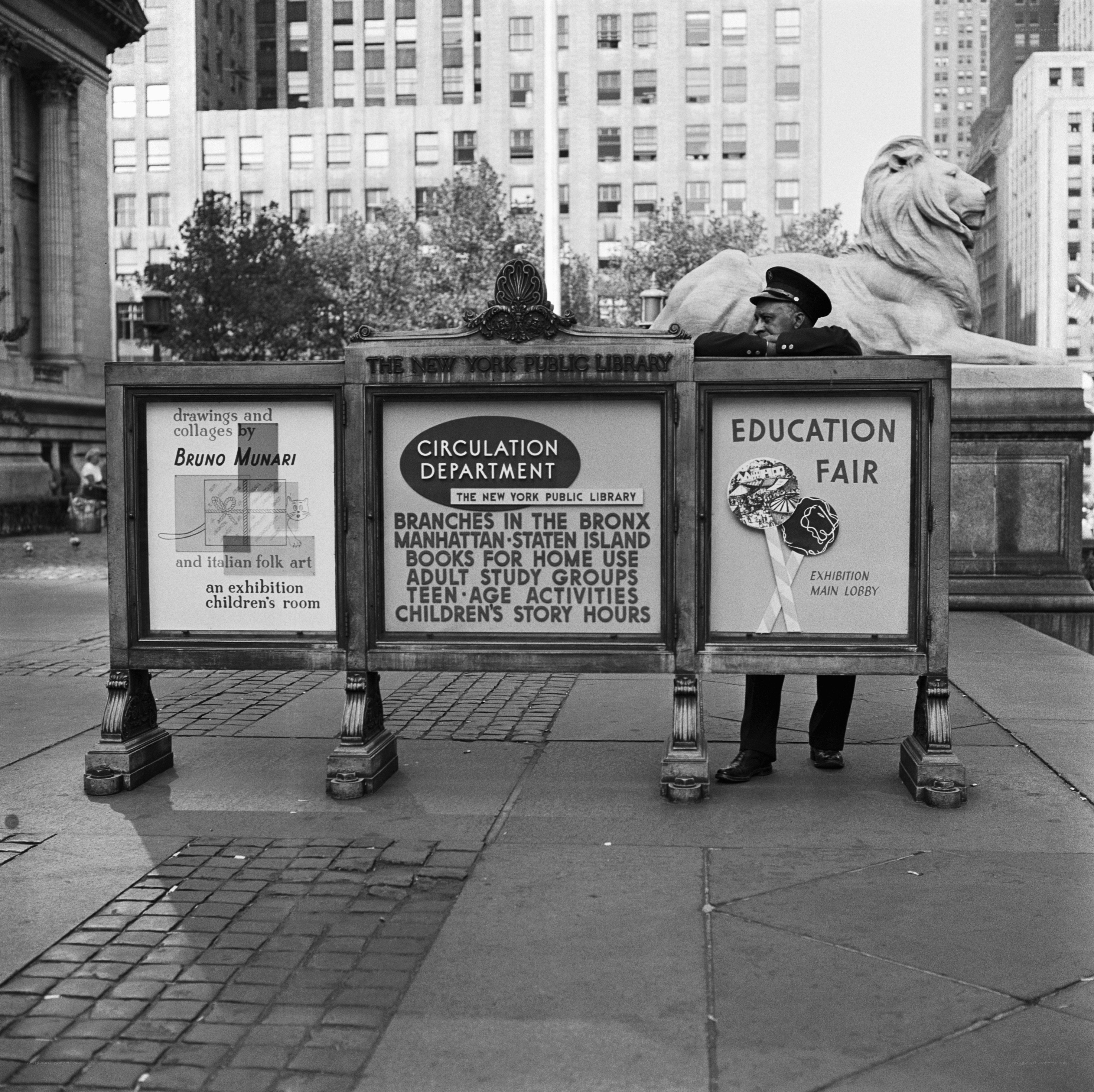 Library display board with lion statue