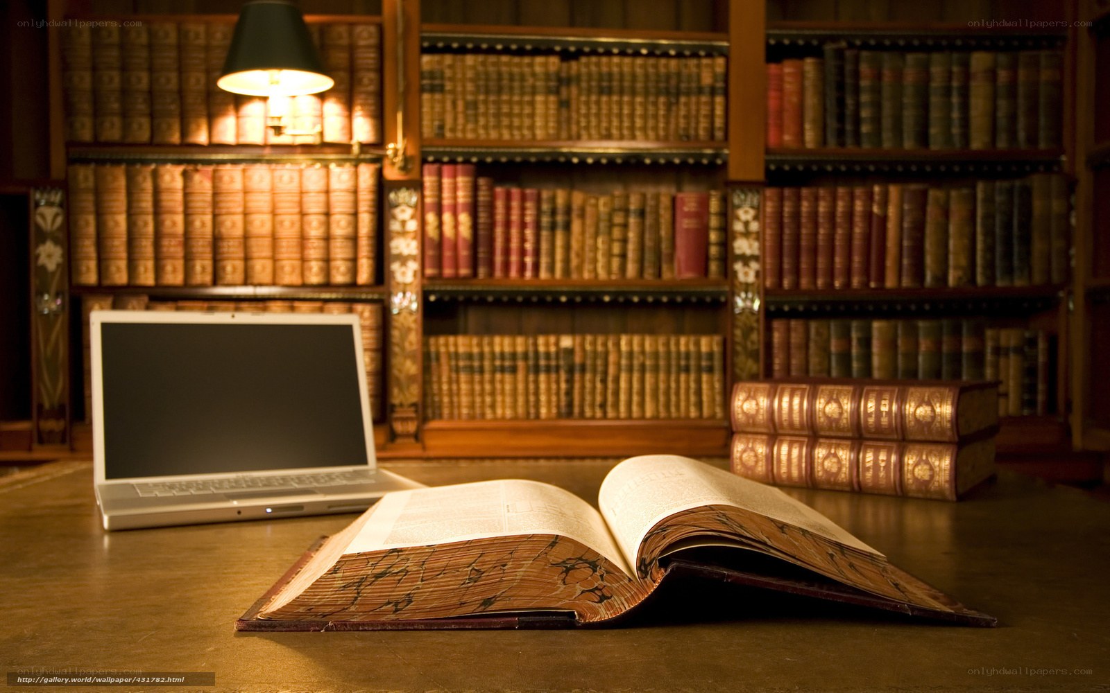 library with laptop and book