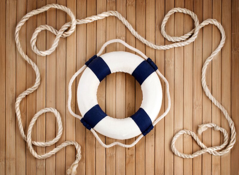 Life Preserver on Wood — White