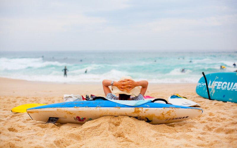 Lifeguard resting on beach