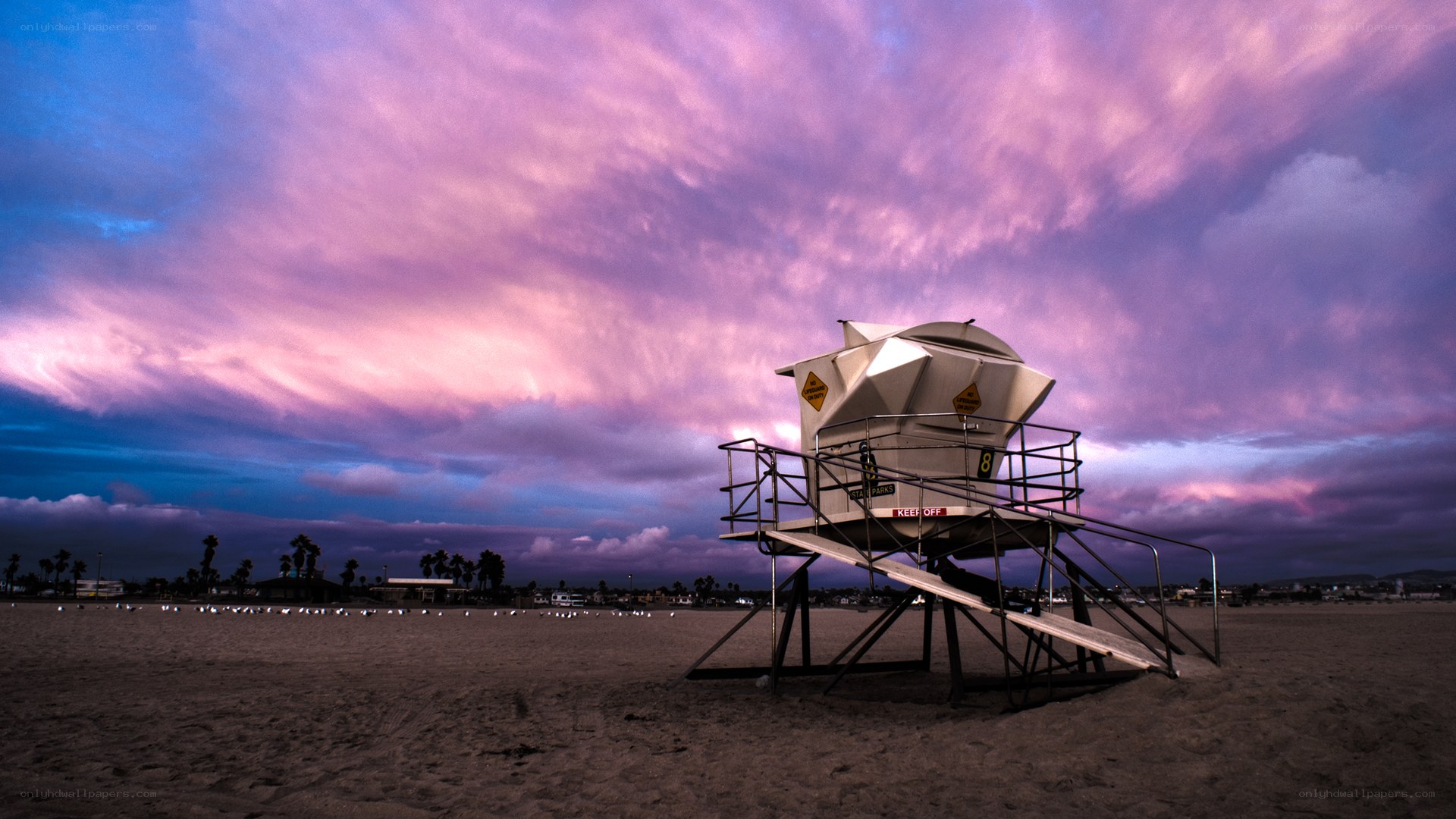Lifeguard tower at sunset