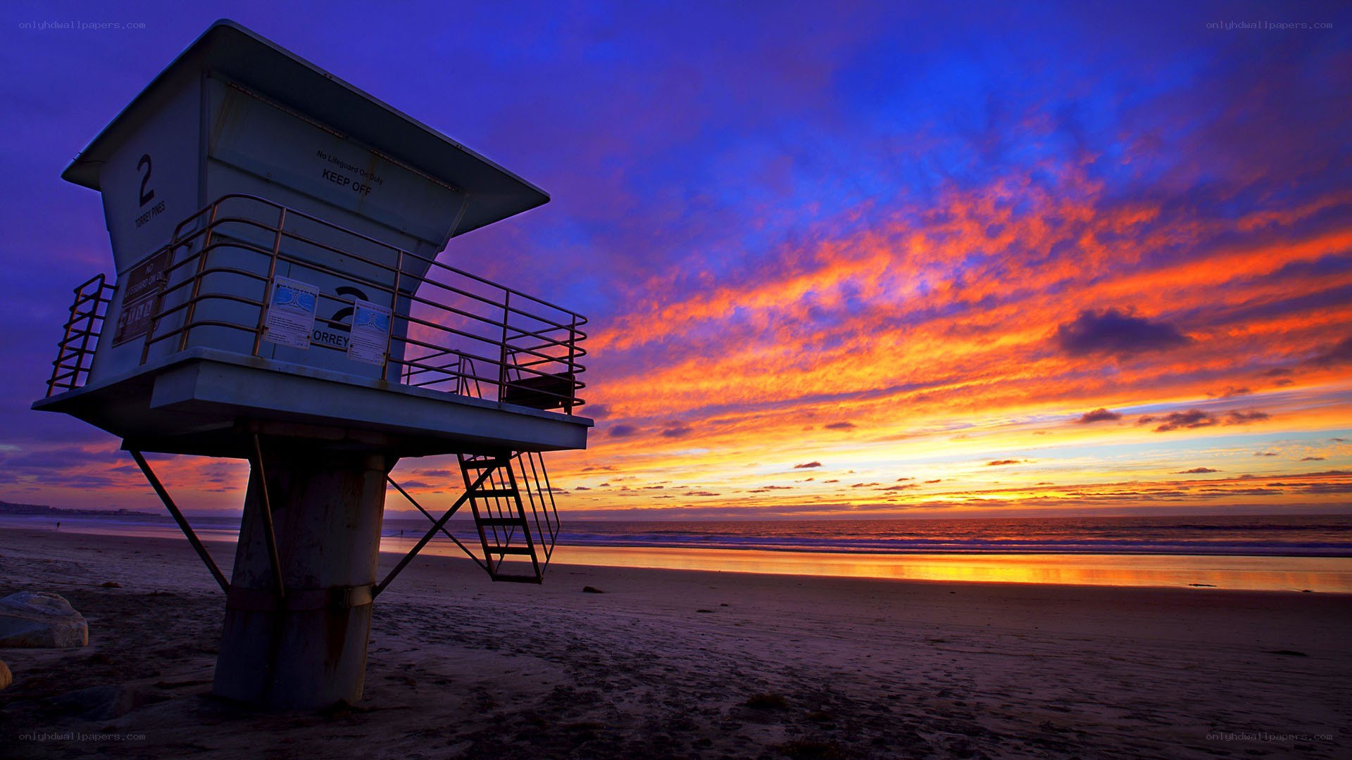 Lifeguard tower at sunset