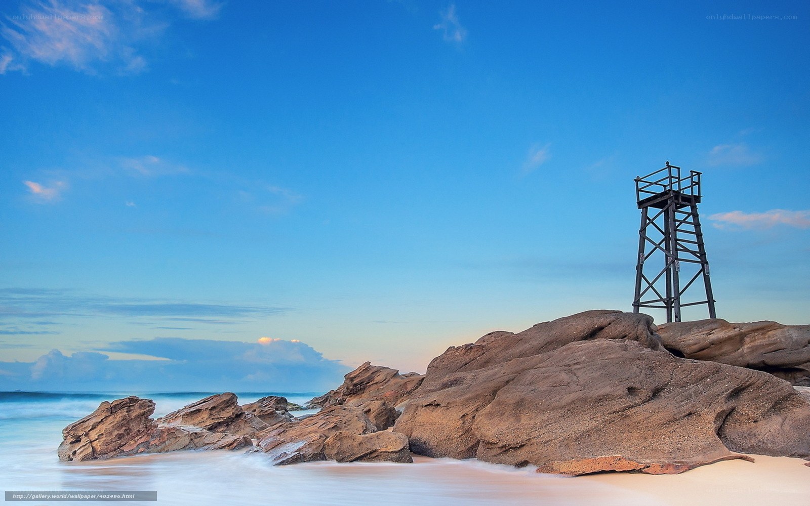 Lifeguard tower on rocky beach
