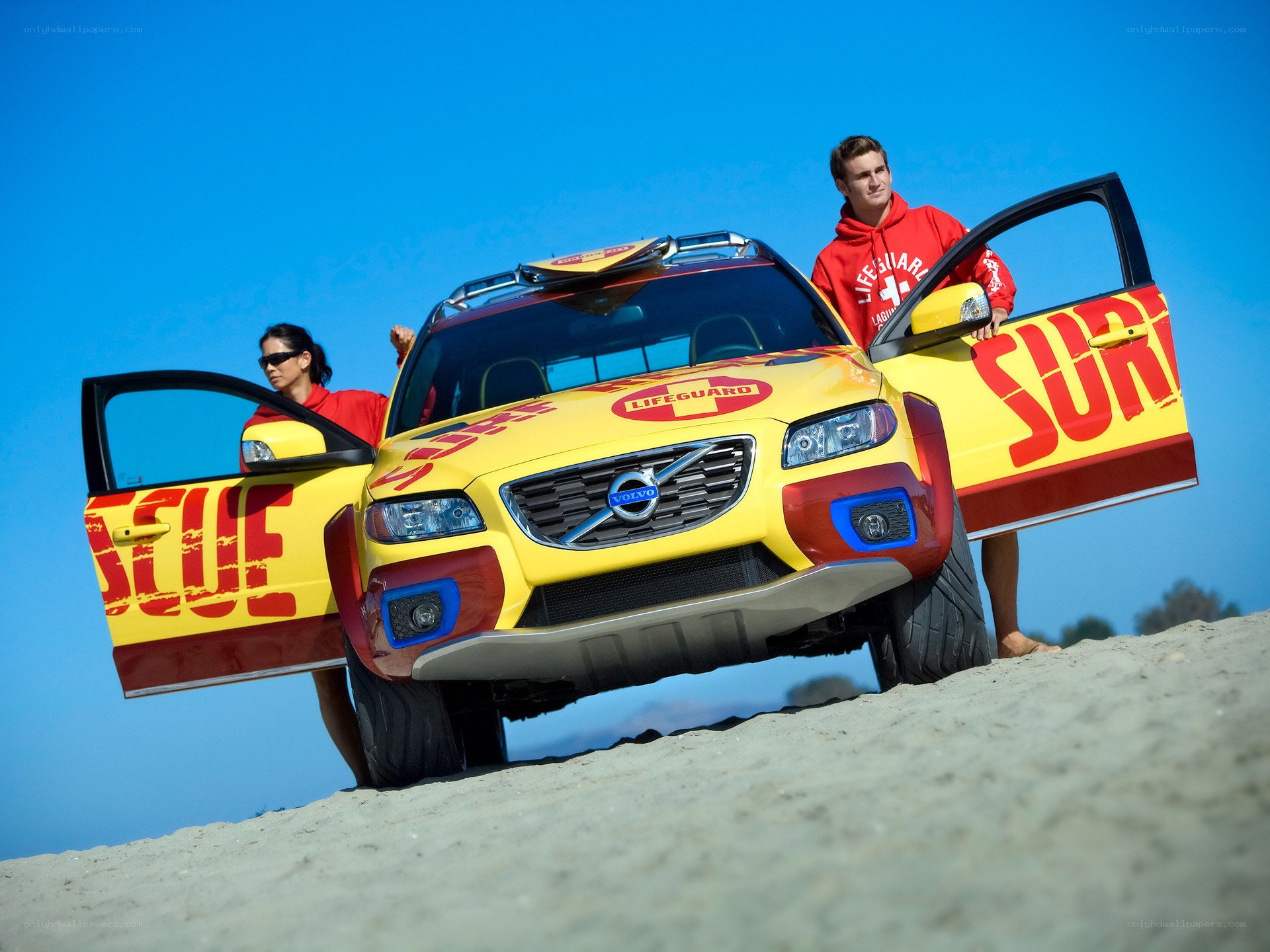 Lifeguards with rescue vehicle