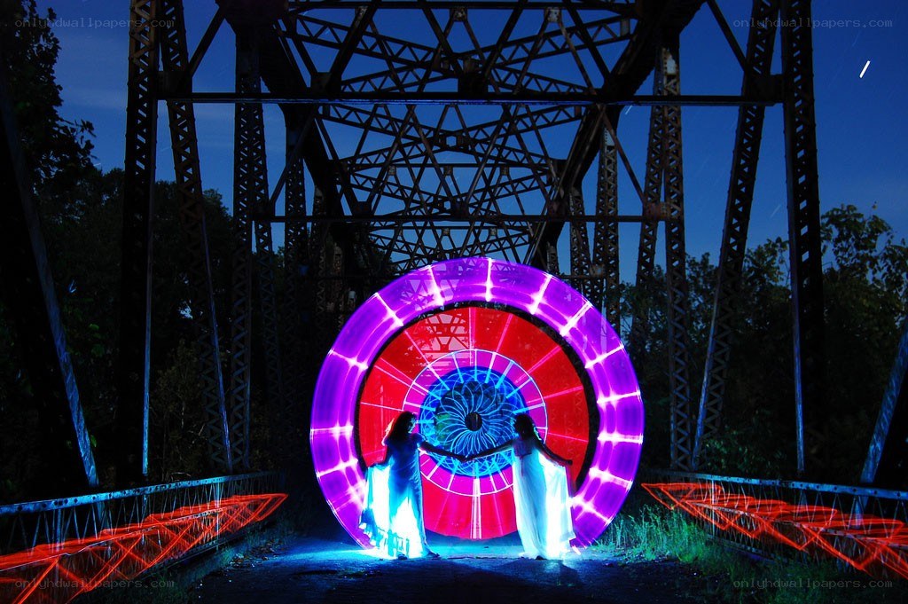 Light art on a bridge at night