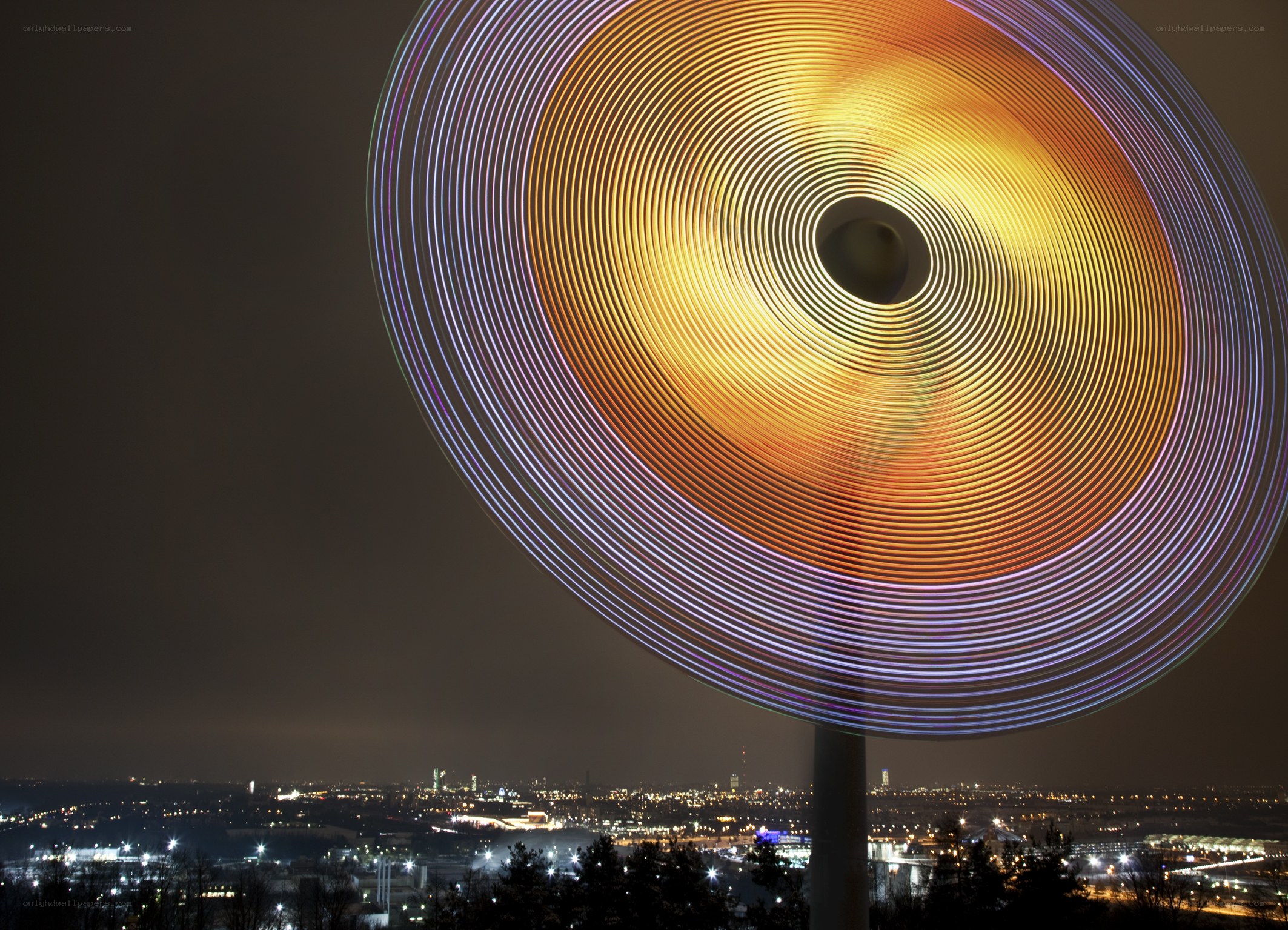 Light art over city at night