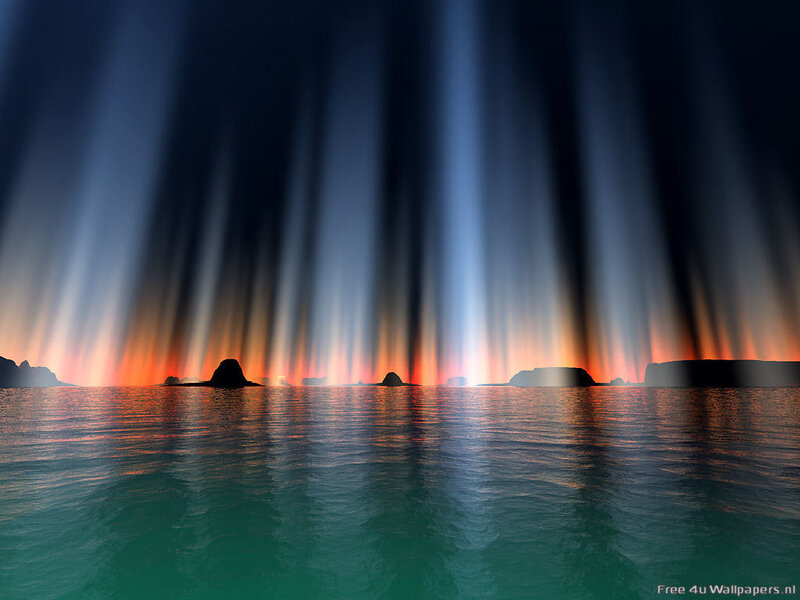light beams over ocean at sunset