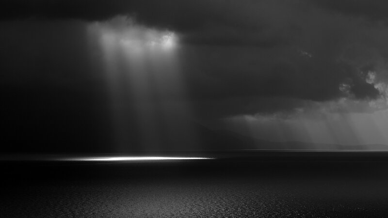 Light Beams Through Storm Clouds — Black