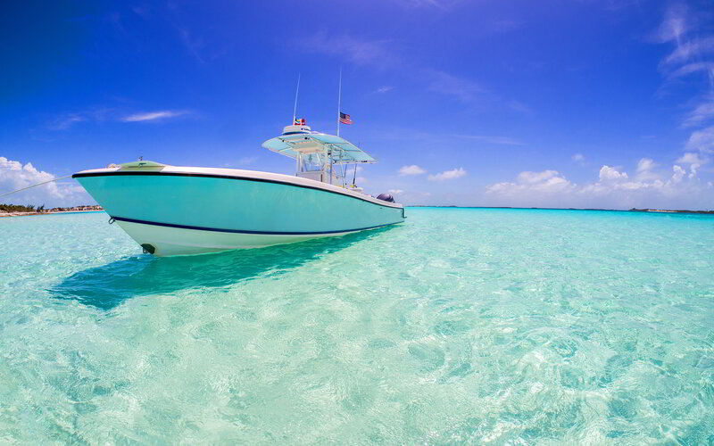 Light-blue Boat in Water — Blue