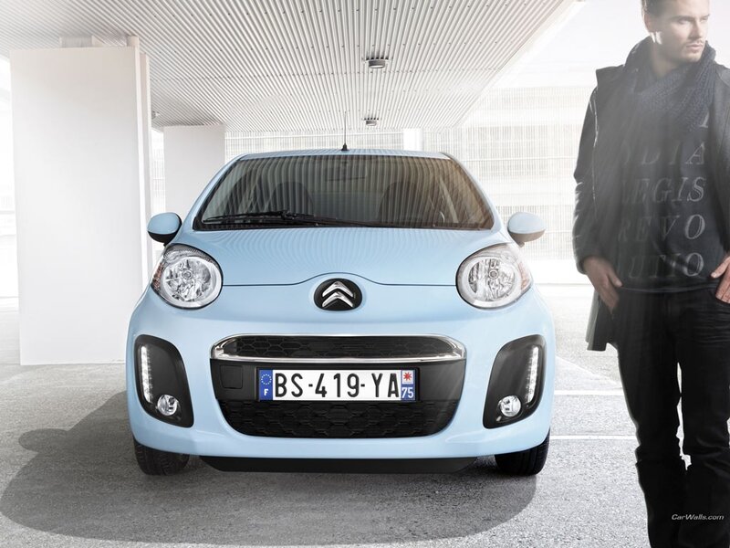 Light-blue Car and Man
