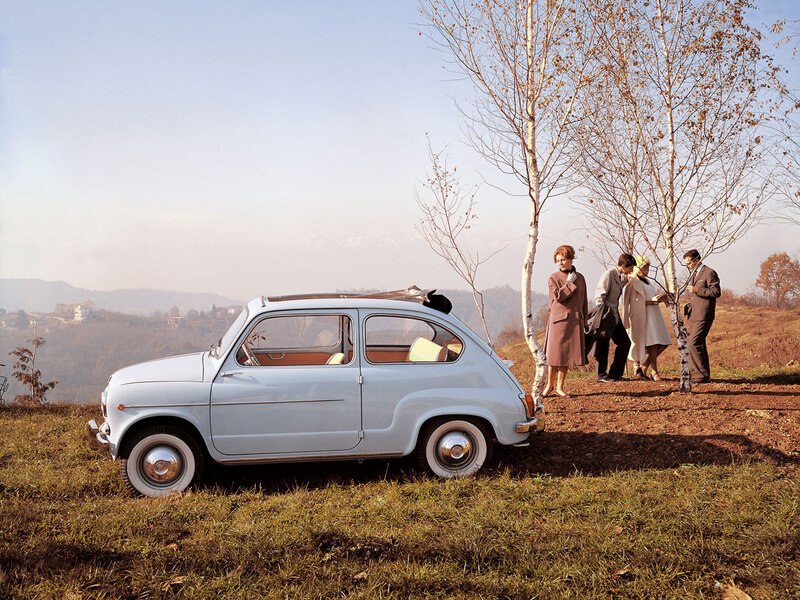 Light-blue Car on Hillside