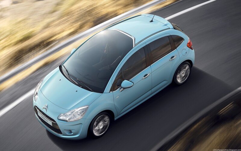 Light-blue Car on Road — Blue