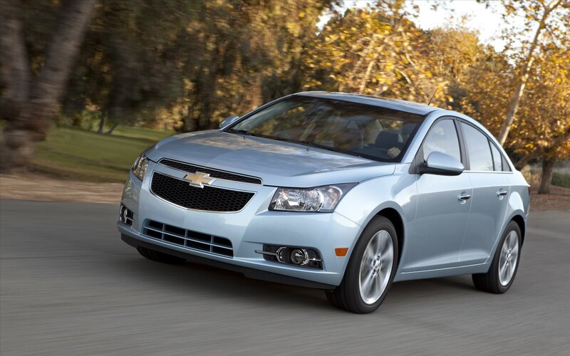 Light blue Chevrolet Cruze in motion