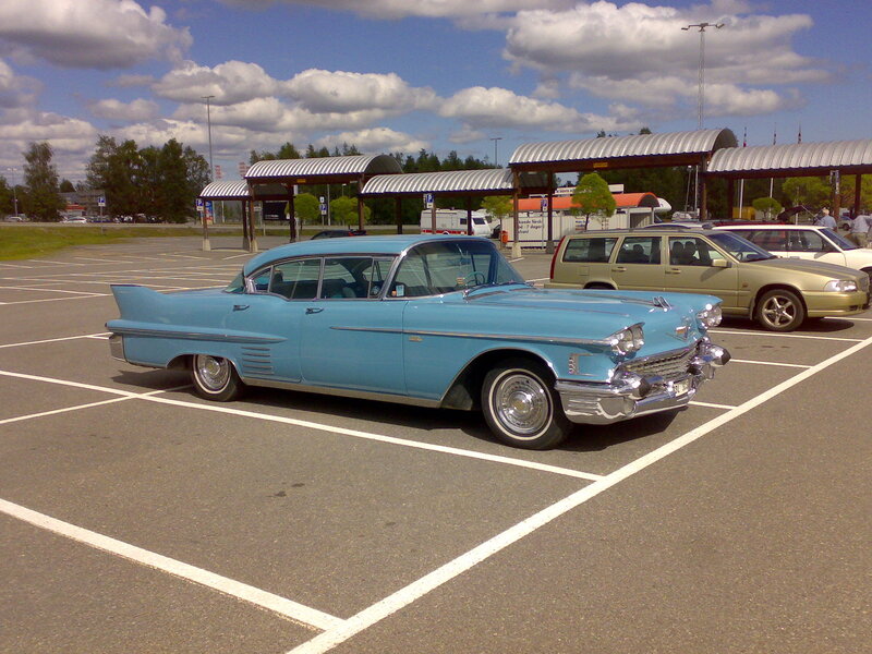 Light-blue Classic Car — Blue, Calm, Afternoon, Photograph, Parking Lot