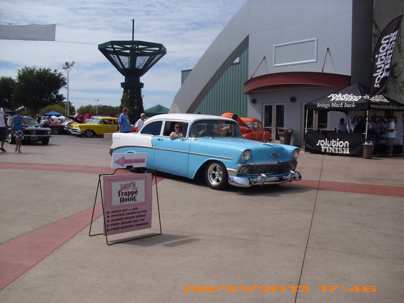 Light-blue Classic Car — Blue, Outdoor, Afternoon, Photograph, People
