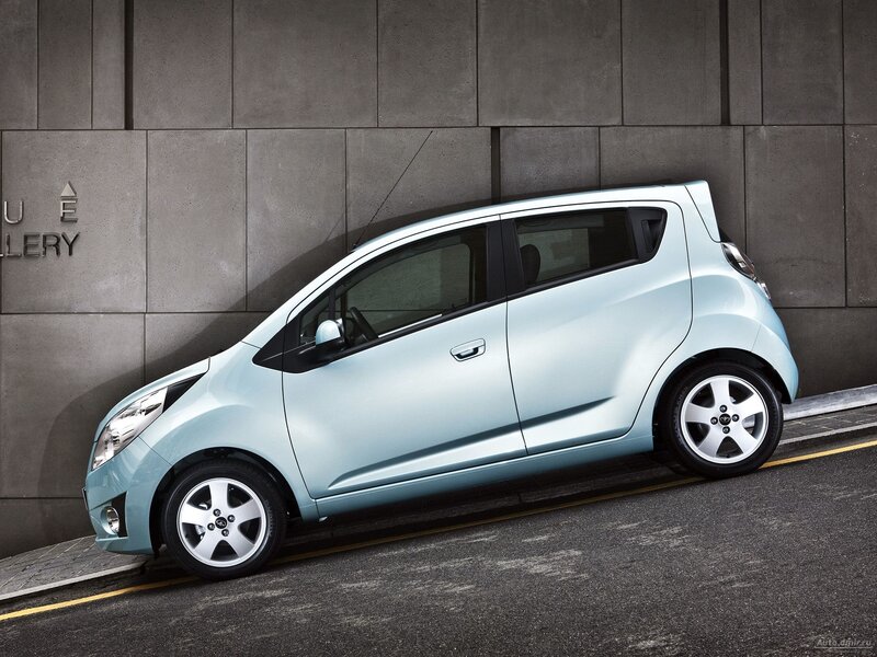 Light blue compact car parked