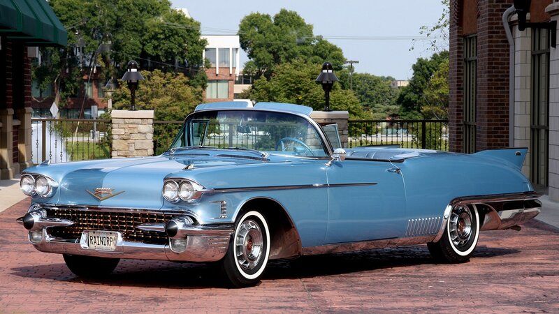 Light-blue Convertible Car — Blue, Calm, Afternoon, Photograph, Brick Pavement