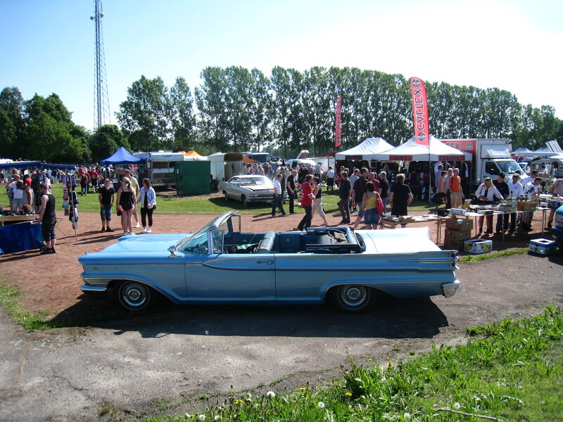 Light-blue Convertible Car — Blue, Outdoor, Afternoon, Photograph