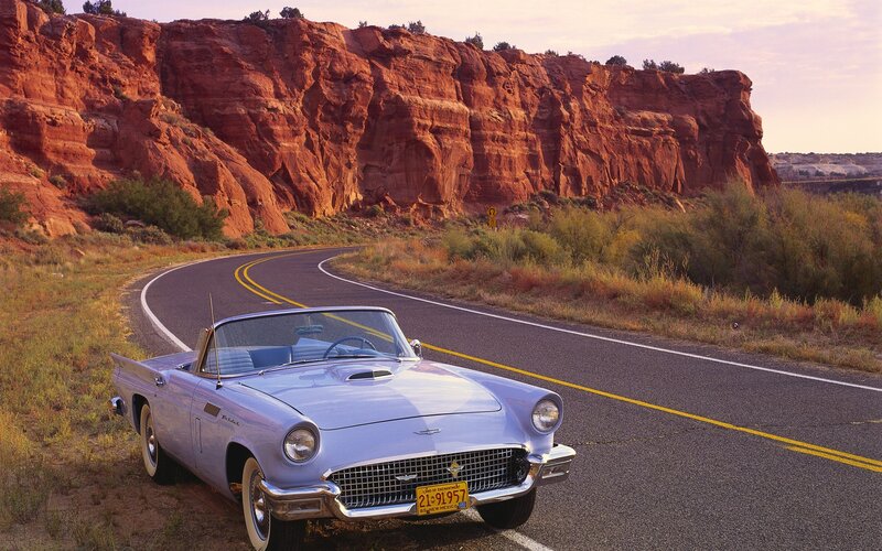 Light-blue Convertible Car — Red
