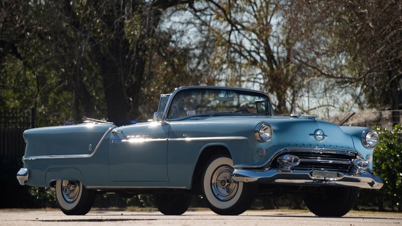 Light Blue Convertible Car — Serene, Afternoon, Photograph, Trees